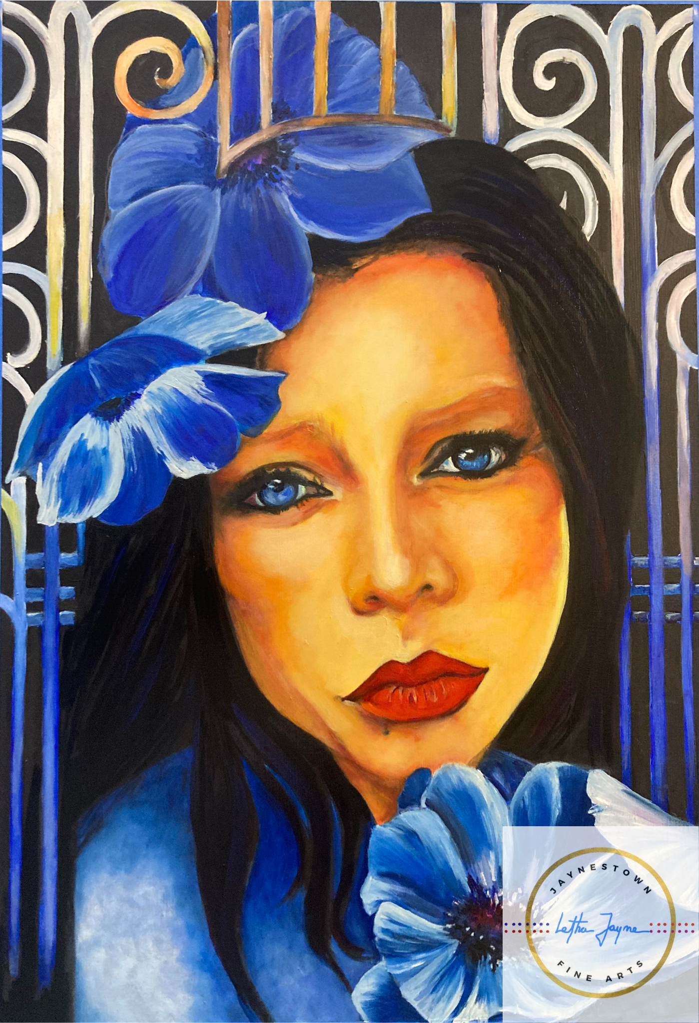 A beautiful girl with large, sad blue eyes, black hair, and red lips peers out. She has blue flowers framing her face and has a scrollwork background reminiscent of art deco.